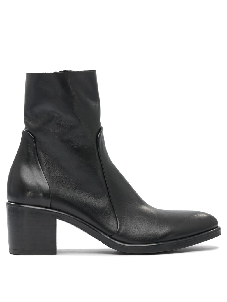 black rubber ankle boots by Selfnex