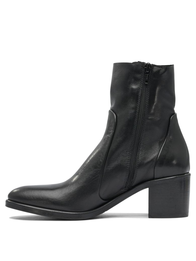 black rubber ankle boots by Selfnex