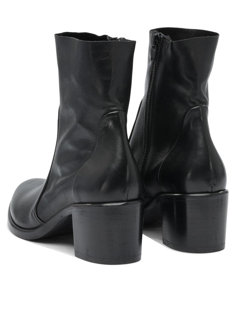 black rubber ankle boots by Selfnex