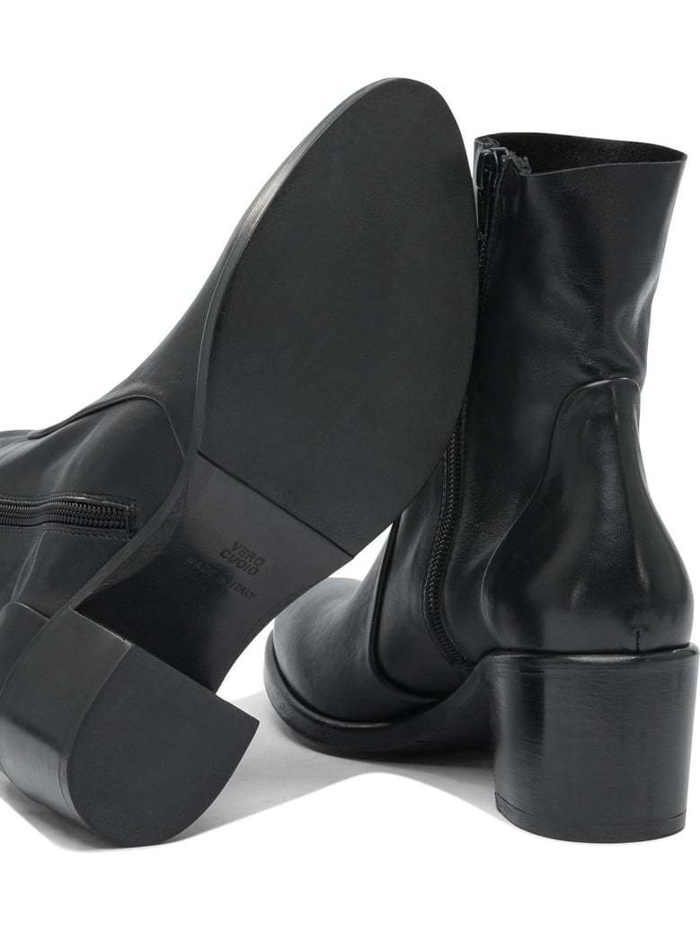 black rubber ankle boots by Selfnex
