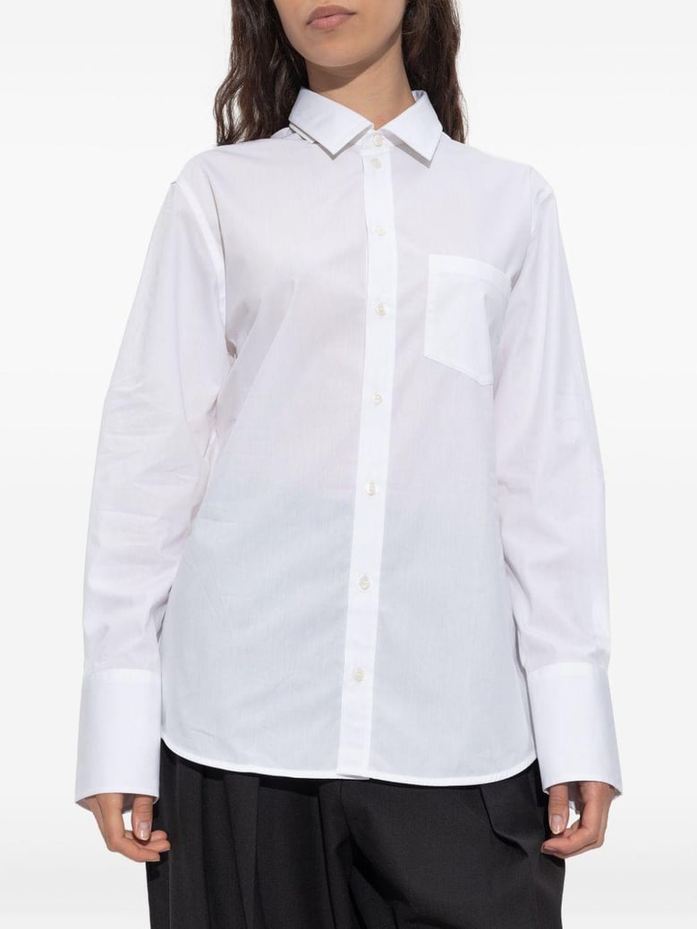 white button-up shirt by Selfnex