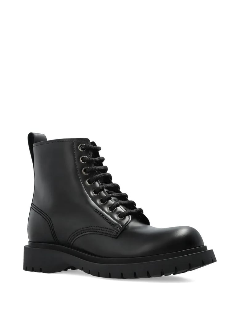 black leather ankle boots by Selfnex