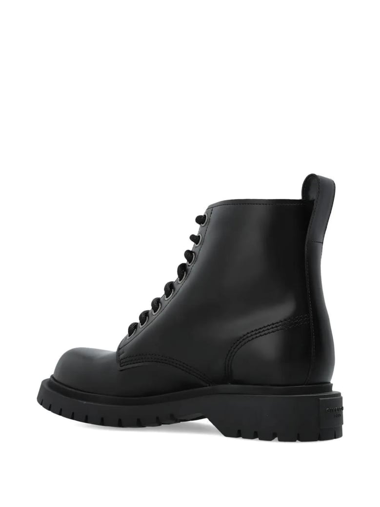 black leather ankle boots by Selfnex