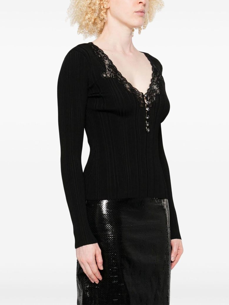 black button front sweater by Selfnex