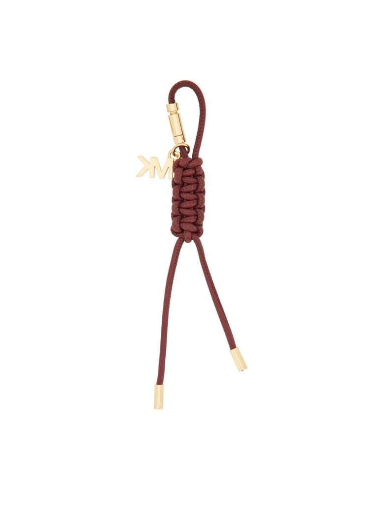 bag charm with logo by Selfnex