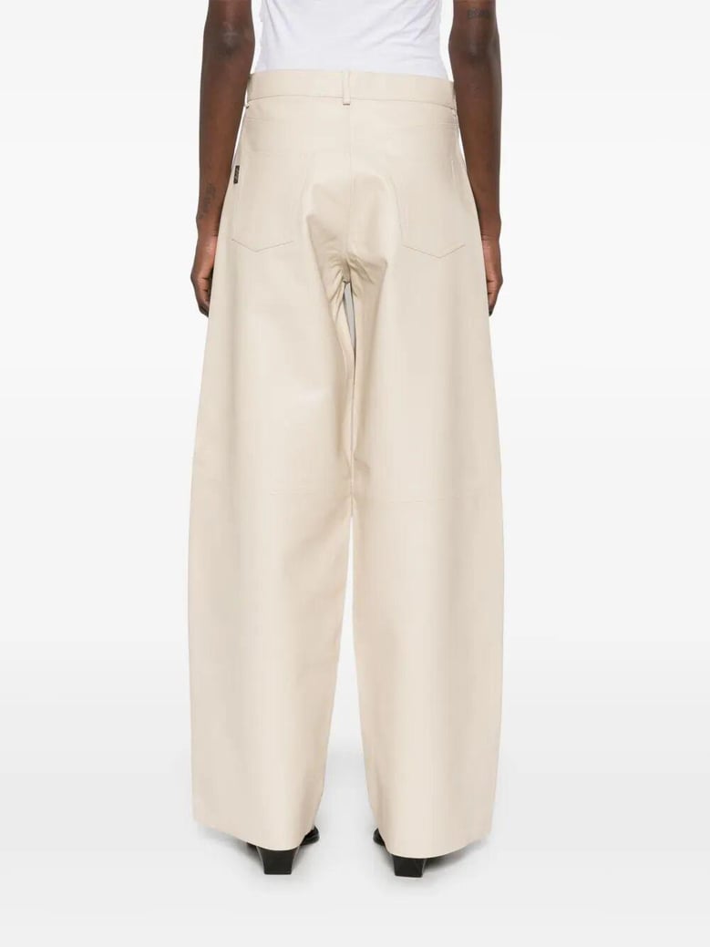 ivory wide leg trousers by Selfnex