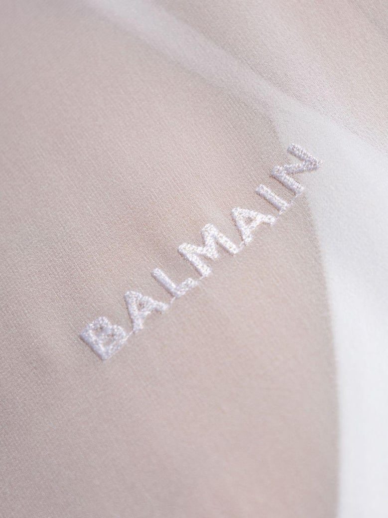transparent crop sleeve top by Selfnex