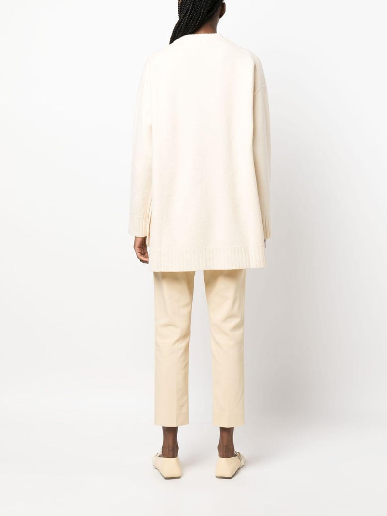 sueter beige detalle abertura by Selfnex