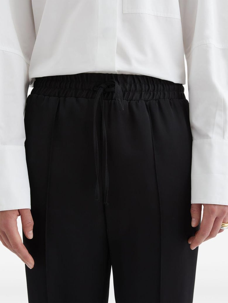 pantalon negro cintura elastica brillo by Selfnex