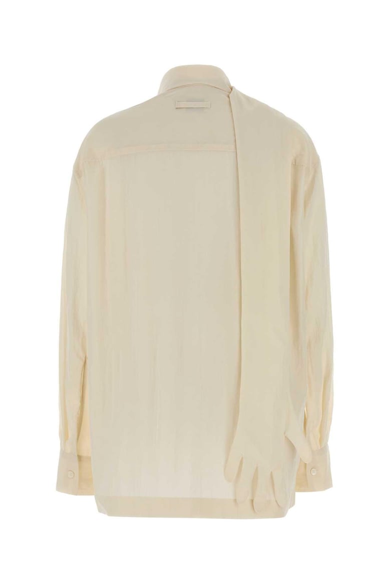 ivory lyocell blend blouse by Selfnex