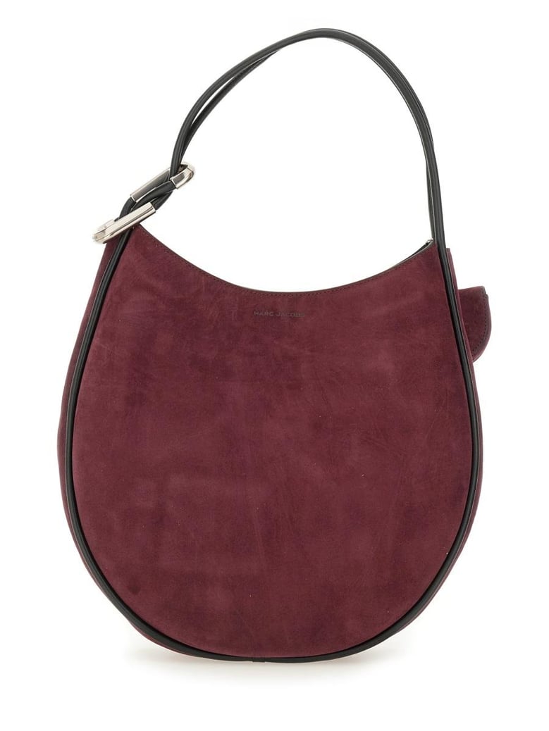 brown handbag by Selfnex