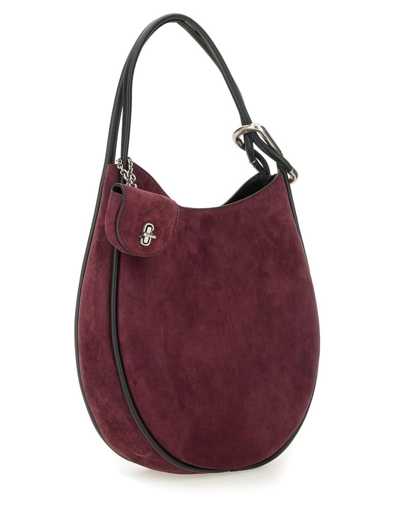 brown handbag by Selfnex