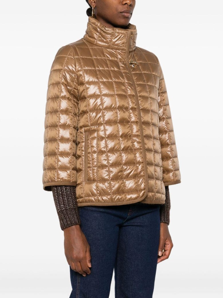 nylon quilted cape by Selfnex