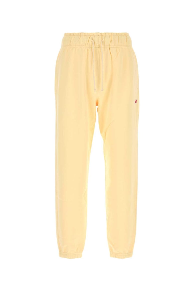 pastel yellow cotton joggers by Selfnex