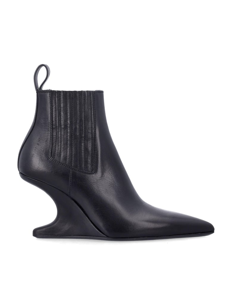sharp ankle bootie by Selfnex