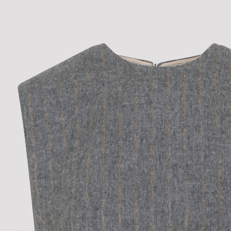 sleeveless shift top by Selfnex
