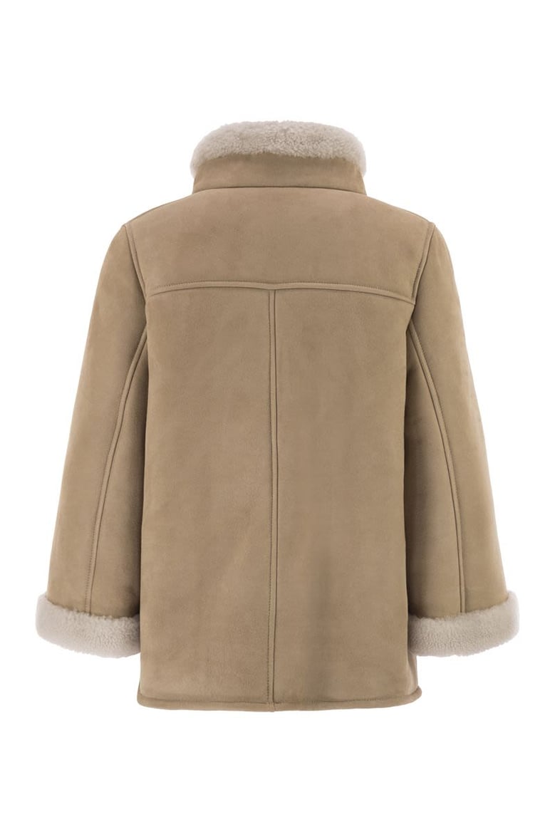 leather shealing cape by Selfnex