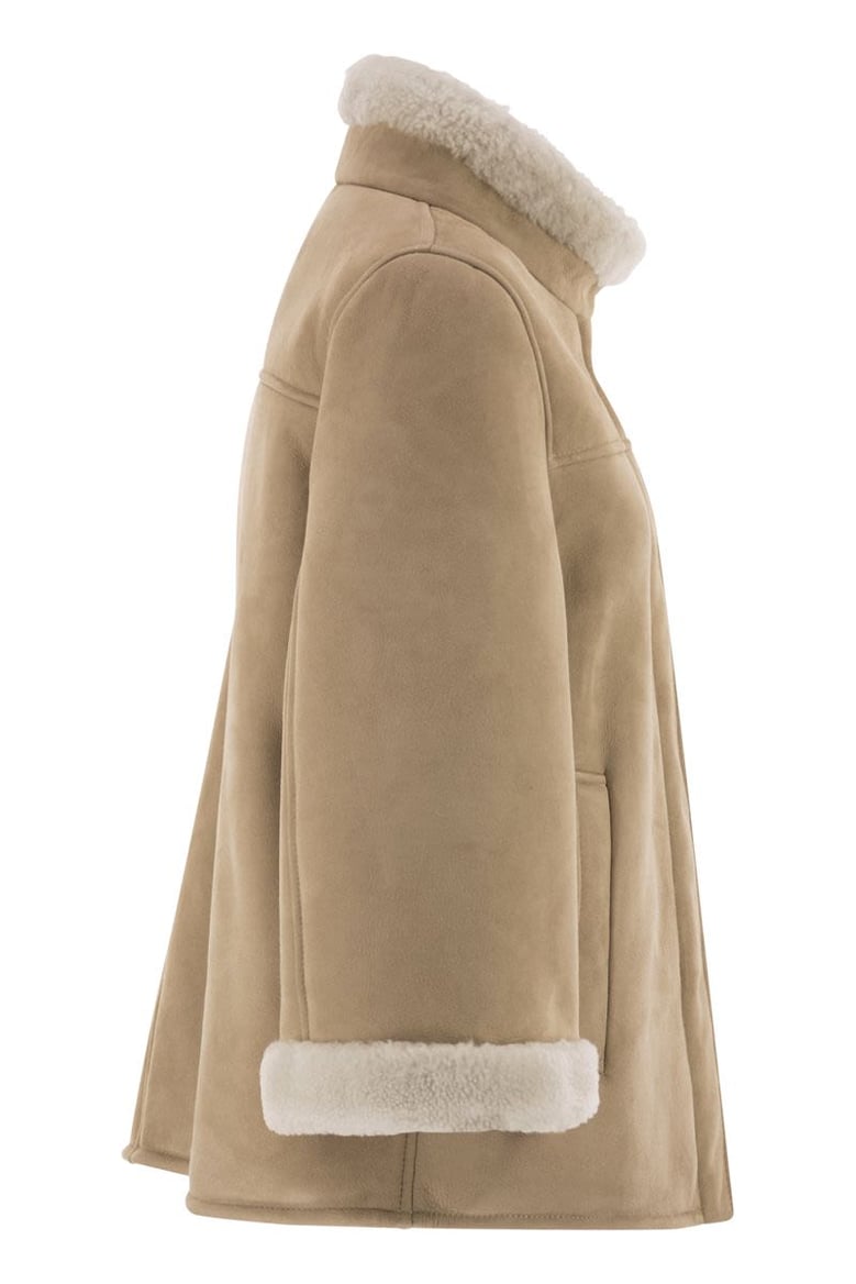 leather shealing cape by Selfnex
