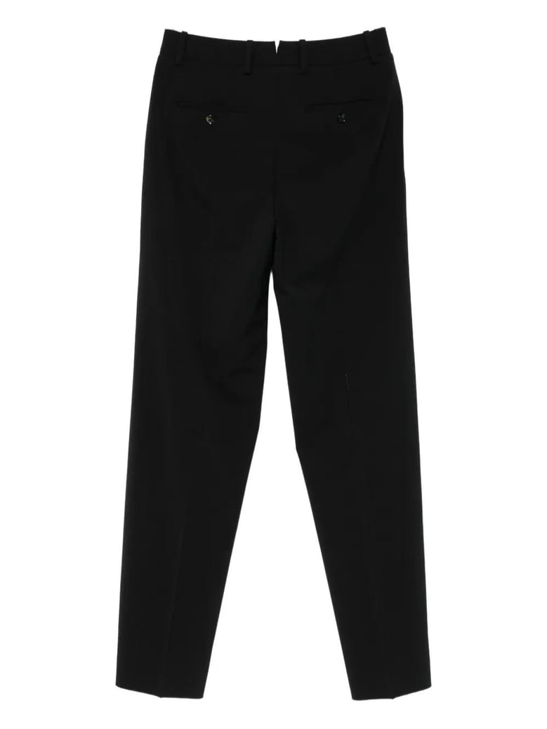 beverly pleated wool trousers by Selfnex