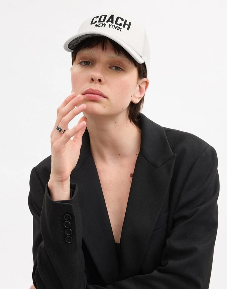 embroidered logo trucker hat cap by Selfnex