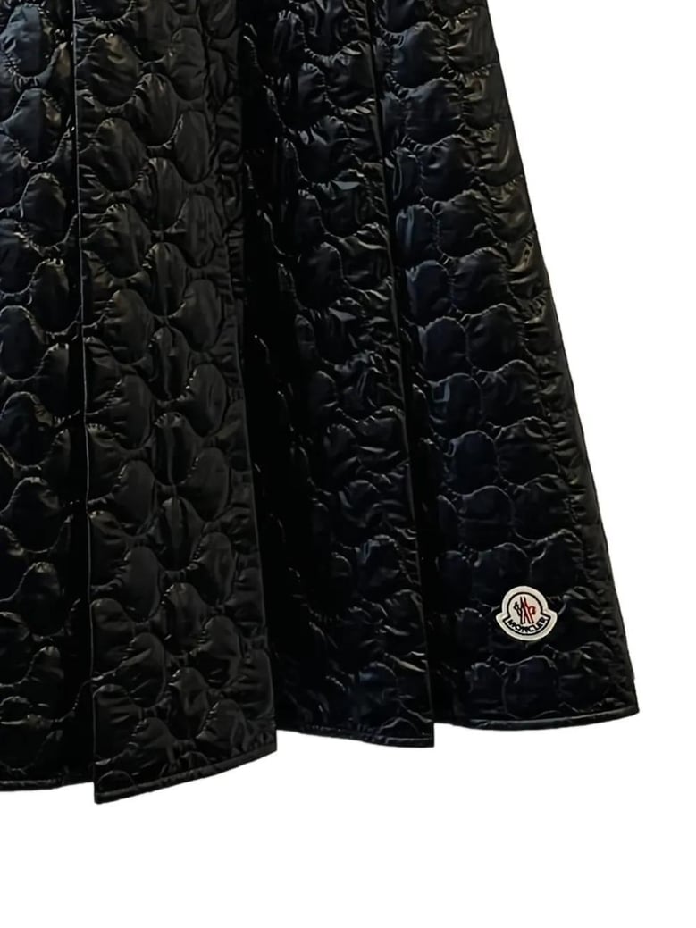 padded midi skirt with square quilting by Selfnex