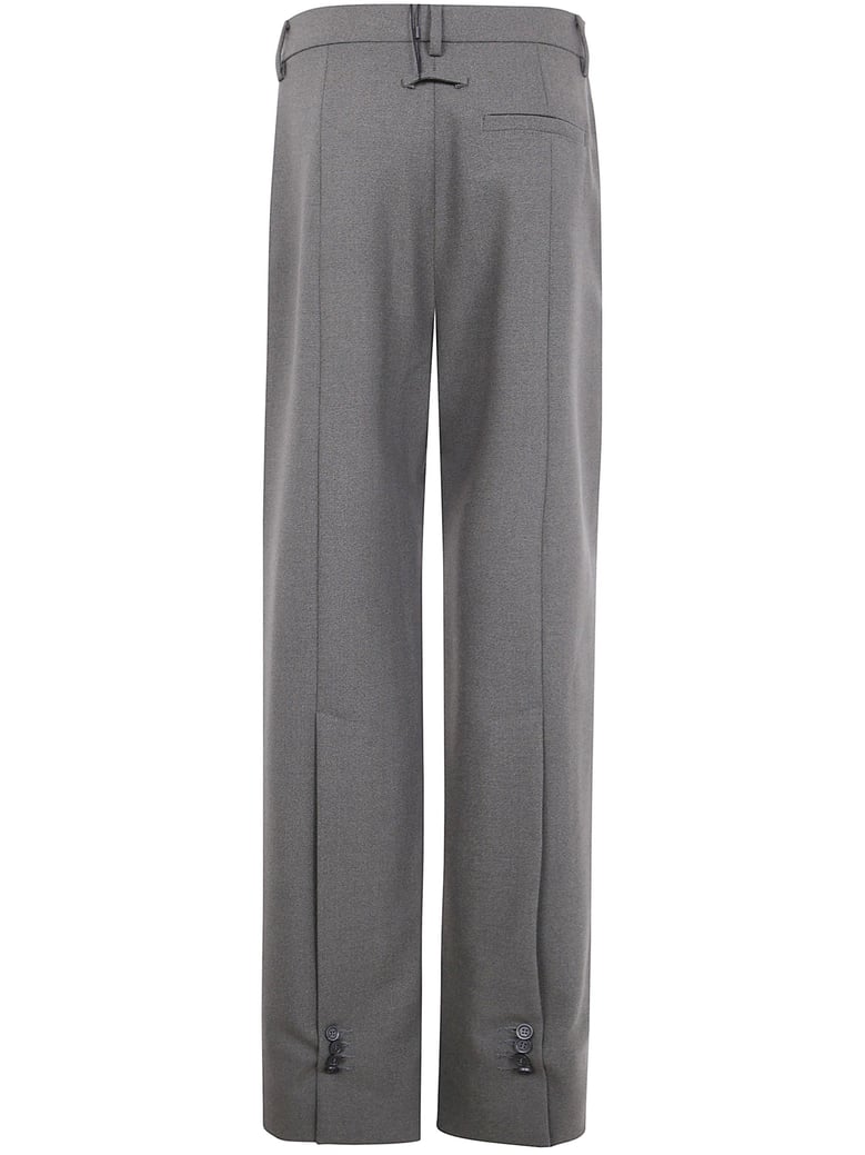 tailoring trouser with hem buttoning detail by Selfnex