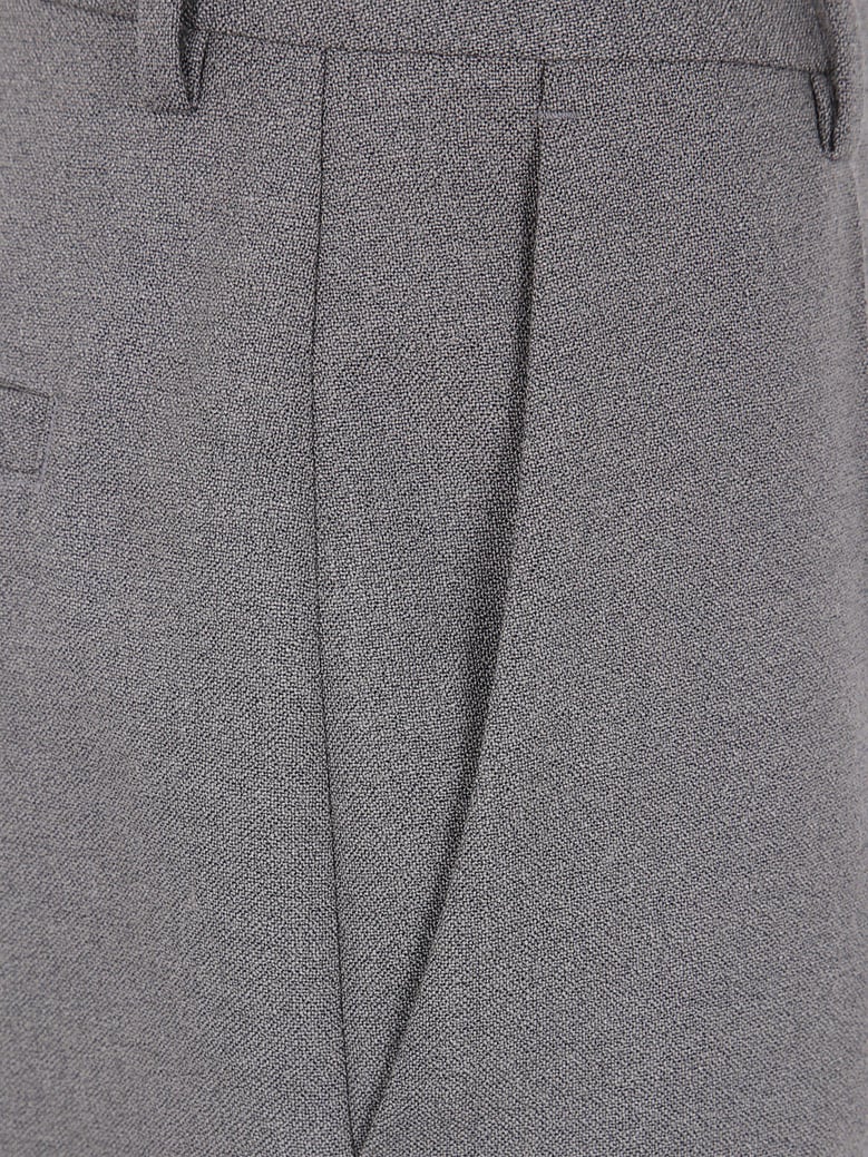 tailoring trouser with hem buttoning detail by Selfnex