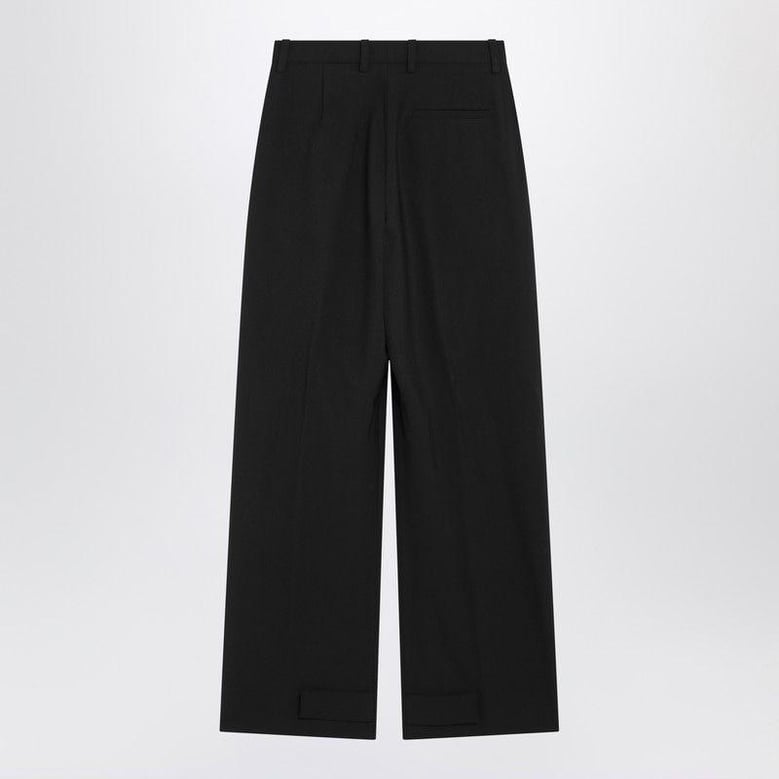 black wool-blend trousers by Selfnex