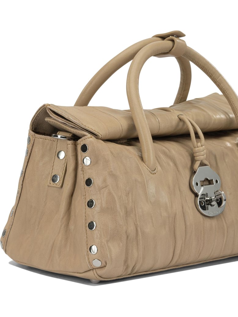 dotta pleated hand bag by Selfnex