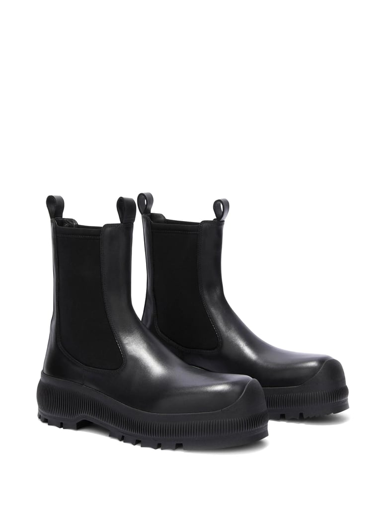 black leather chelsea boots by Selfnex