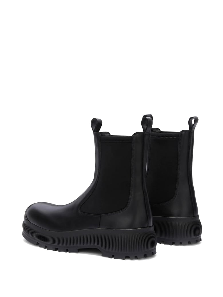 black leather chelsea boots by Selfnex