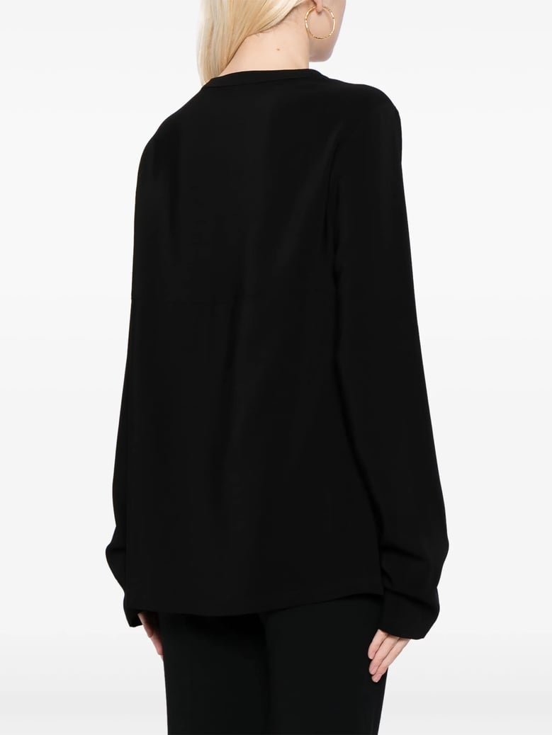 iconic zip detailed black top by Selfnex