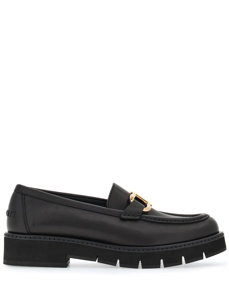 black leather moccasins by Selfnex