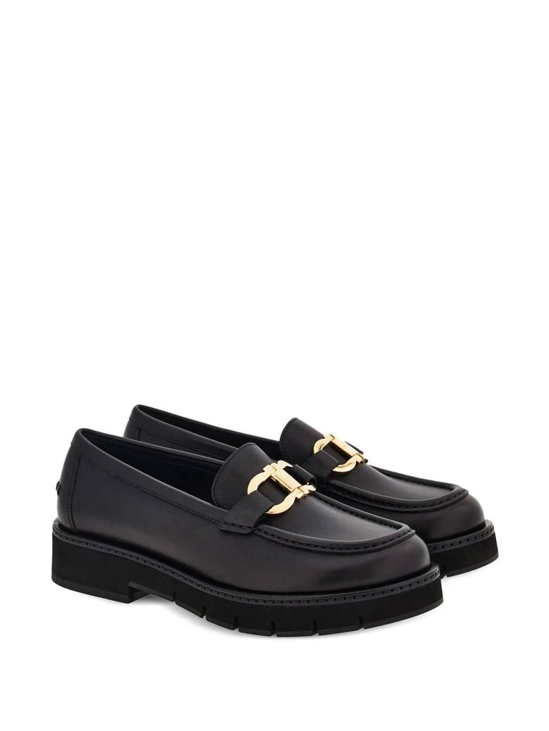 black leather moccasins by Selfnex