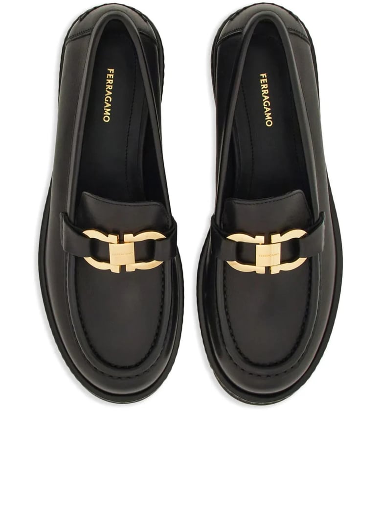 black leather moccasins by Selfnex