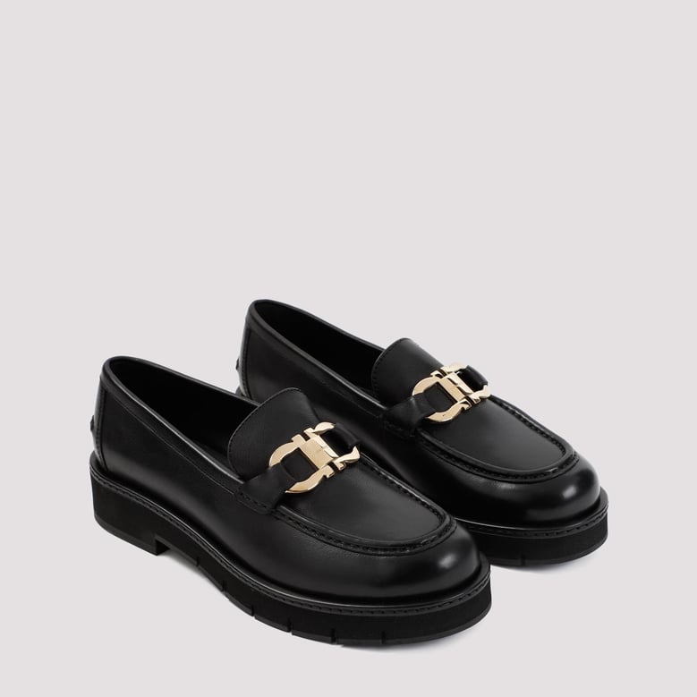 black leather moccasins by Selfnex