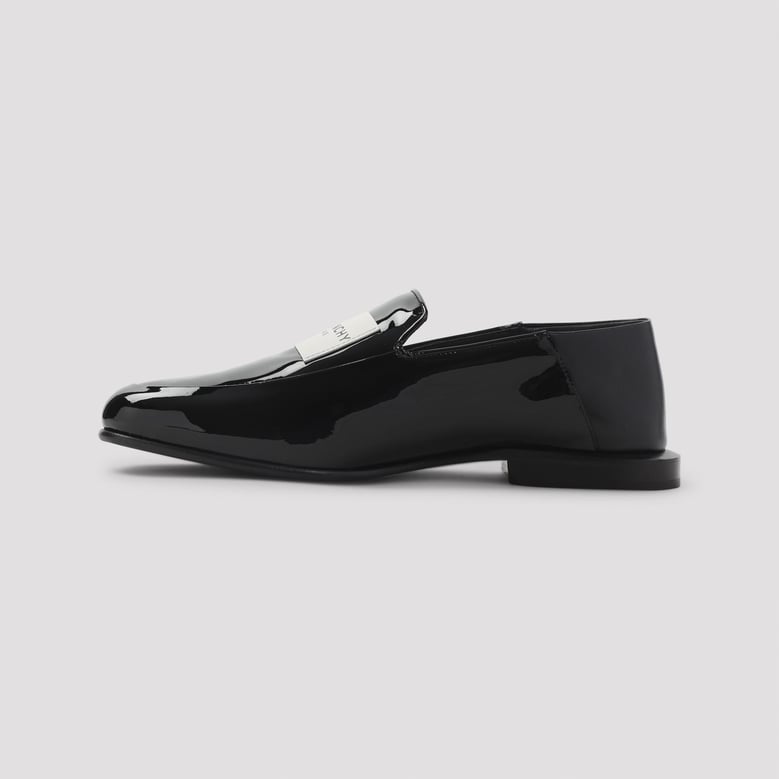 black leather label loafers by Selfnex