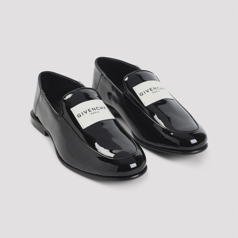 black leather label loafers by Selfnex