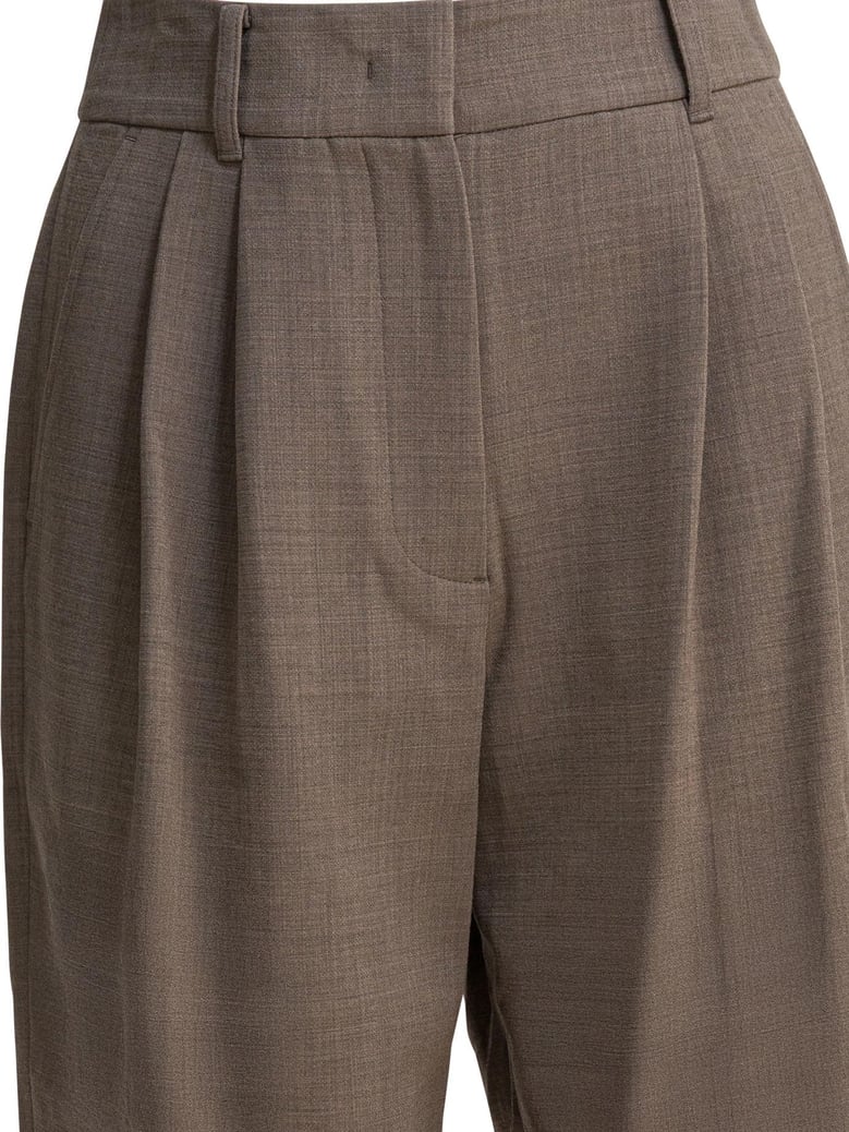 beige wool blend trousers by Selfnex
