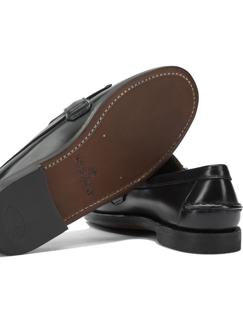black leather loafers by Selfnex