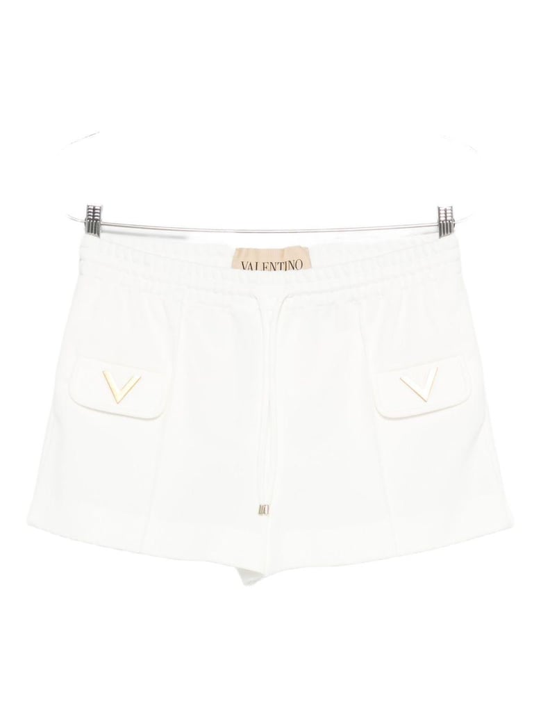 white stretch piquet shorts by Selfnex