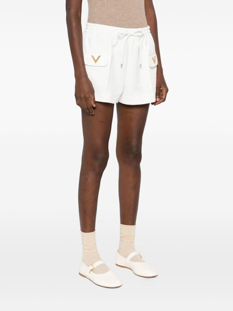 white stretch piquet shorts by Selfnex