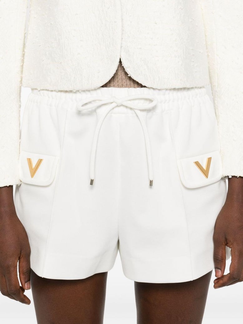white stretch piquet shorts by Selfnex