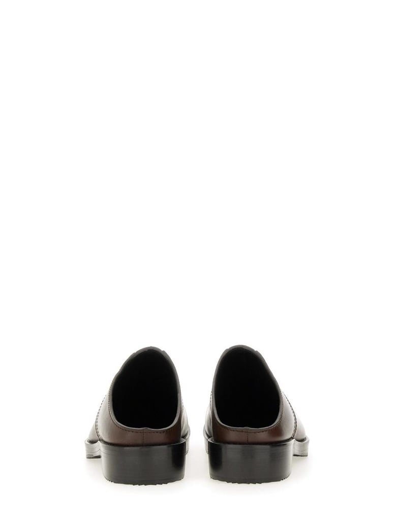 leather clogs by Selfnex