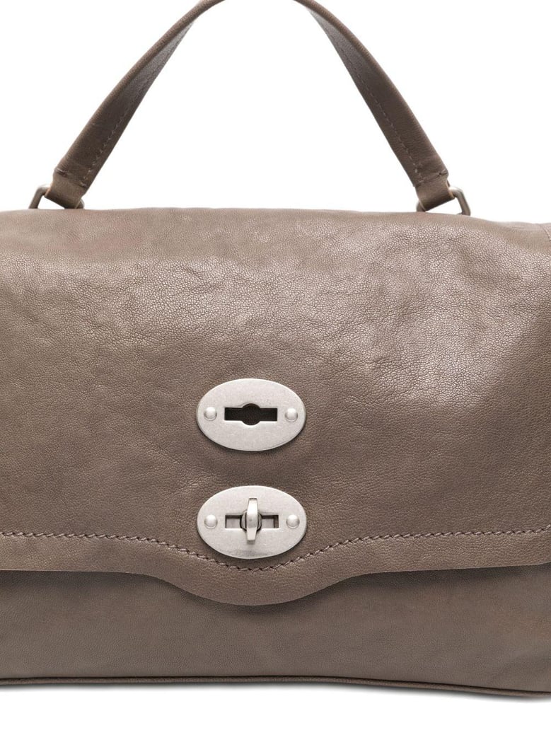 postina tabacco baby leather handbag by Selfnex
