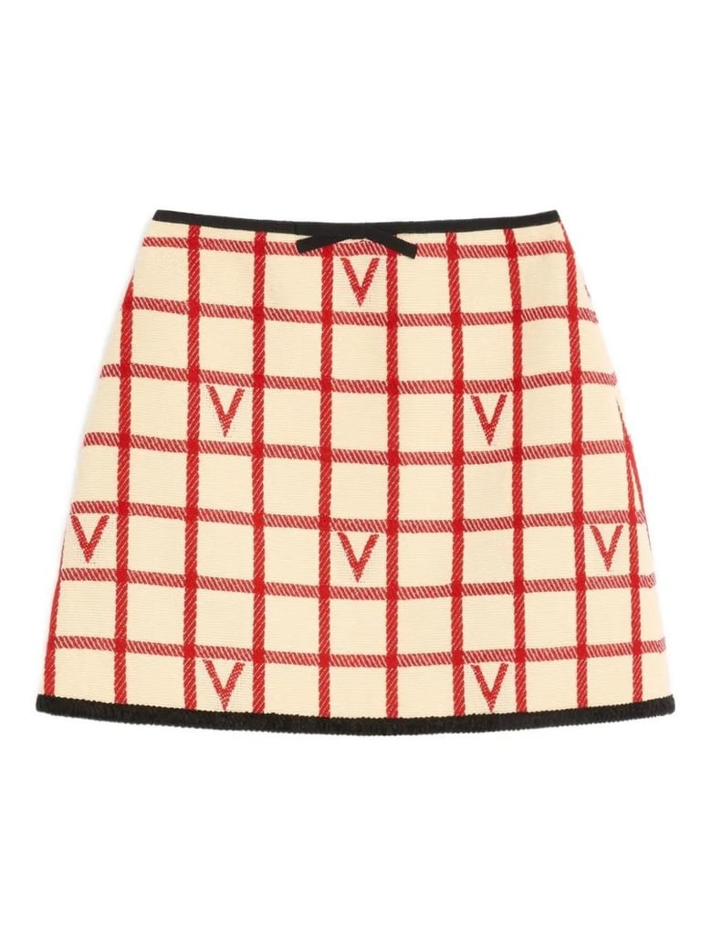 ivory skirt with check vlogo pattern by Selfnex