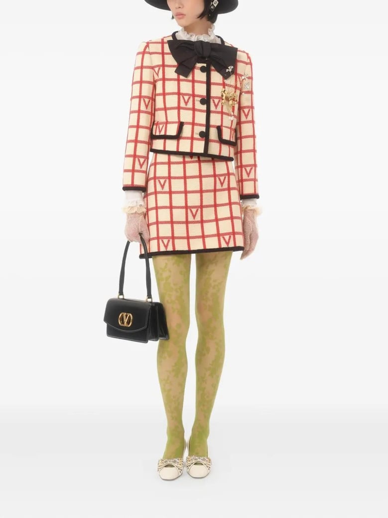 ivory skirt with check vlogo pattern by Selfnex