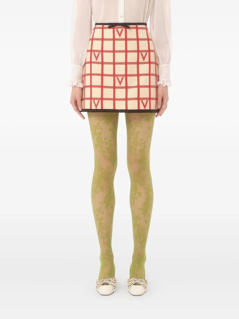 ivory skirt with check vlogo pattern by Selfnex