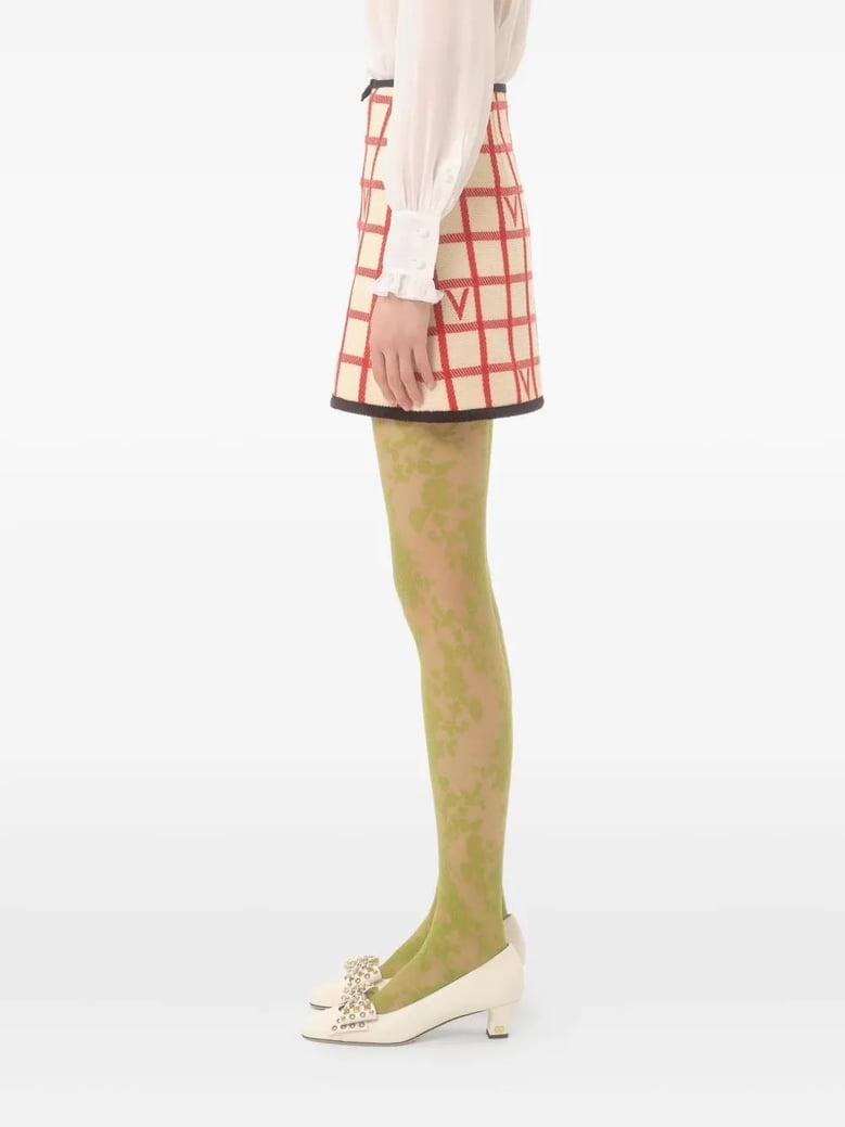 ivory skirt with check vlogo pattern by Selfnex