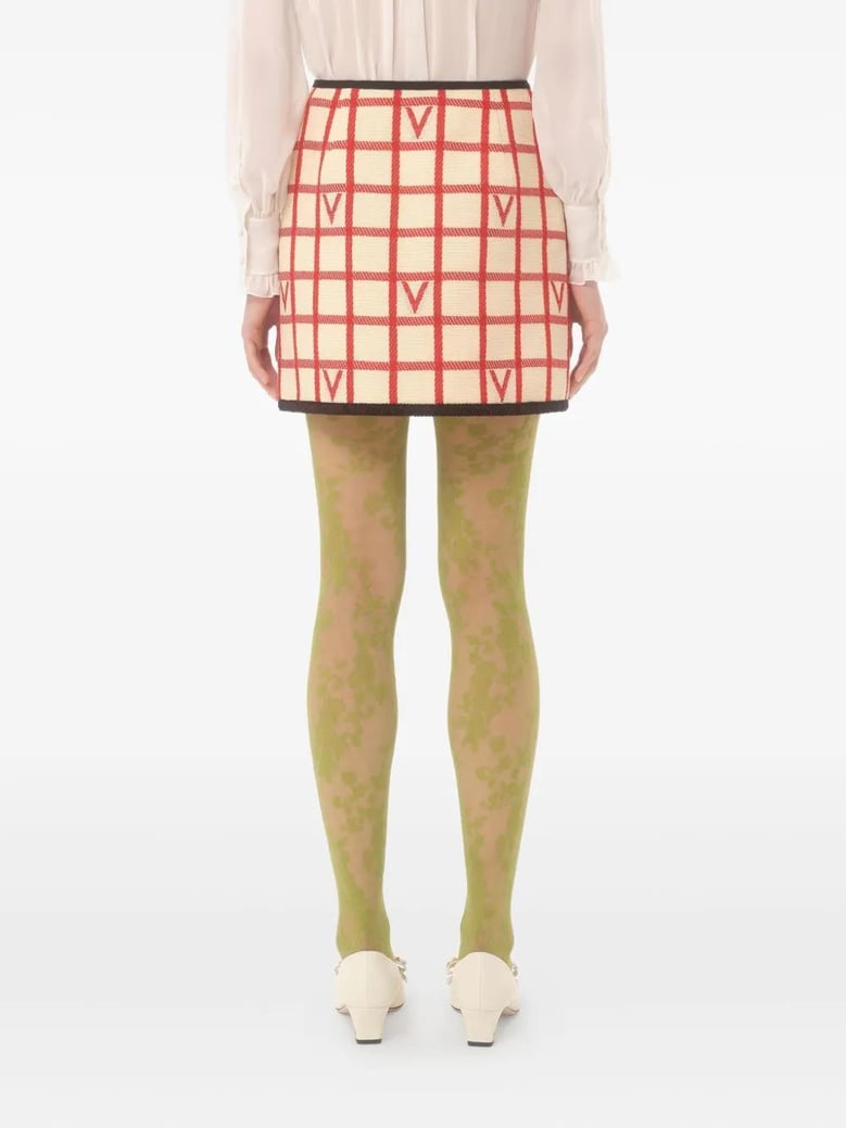 ivory skirt with check vlogo pattern by Selfnex